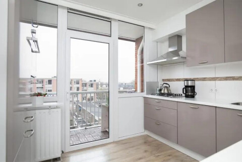 Kitchen including diswasher, microwave/oven and space for washing machine